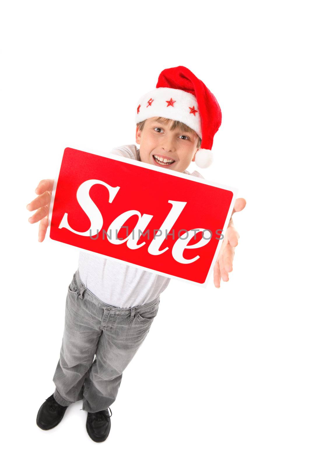 Standing child holding a sale sign up high suitable for pre or post Christmas sales