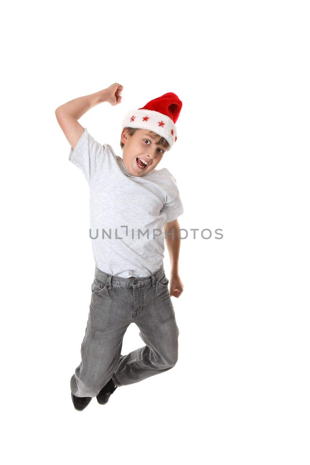 A child leaping into the air in celebration of Christmas