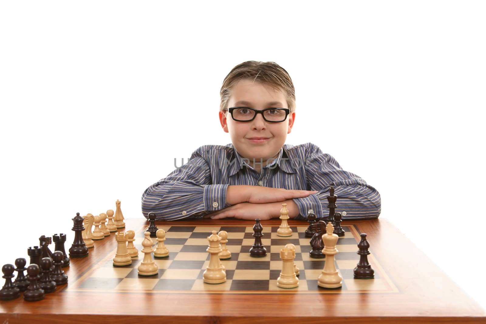 Chess champion poses and  smiles at his winning move