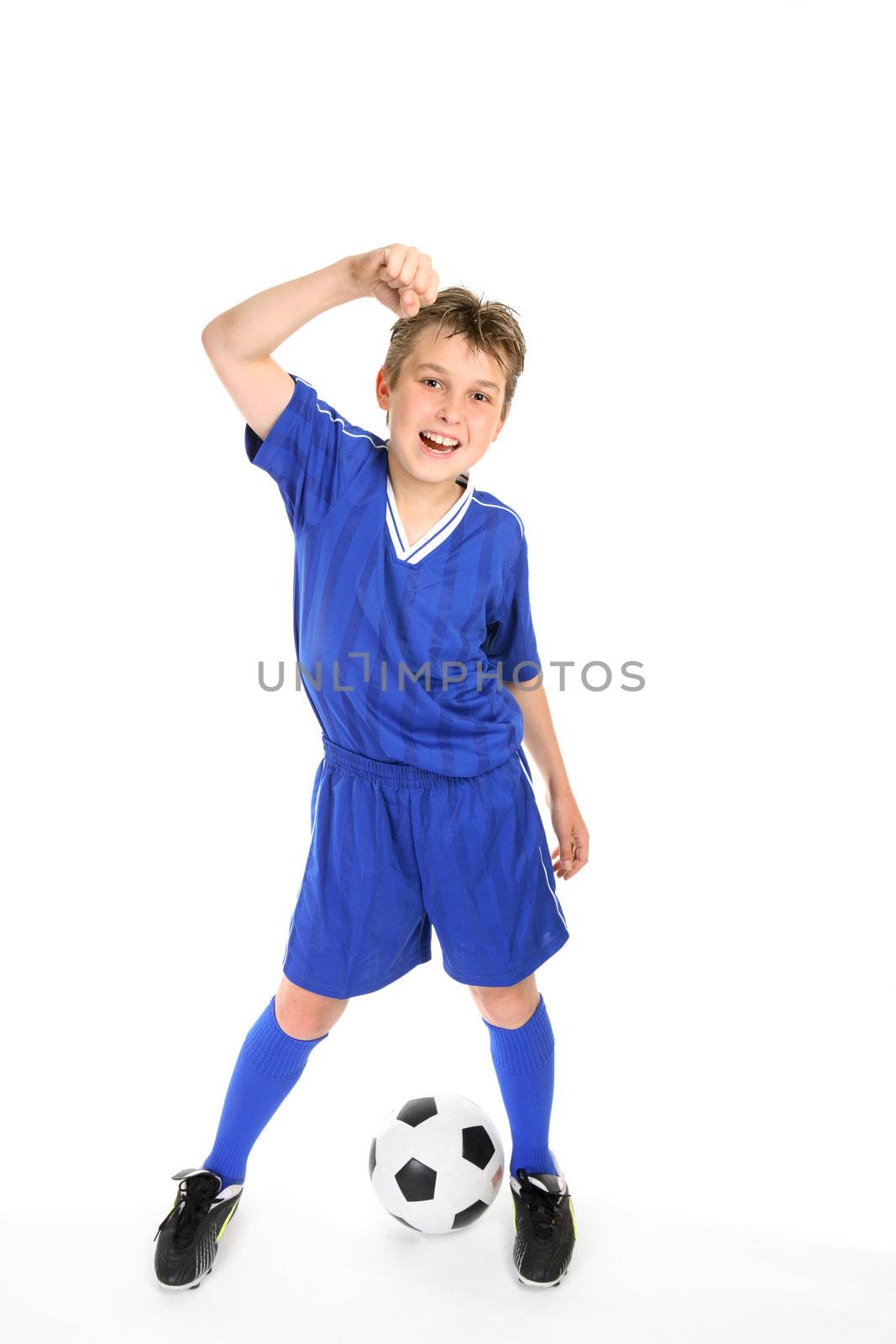A boy thumps the air with a fist of success.
