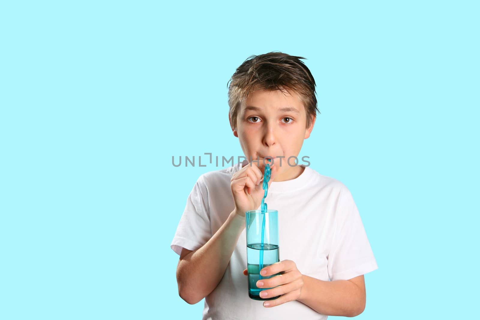 A child drinking pure fresh water.