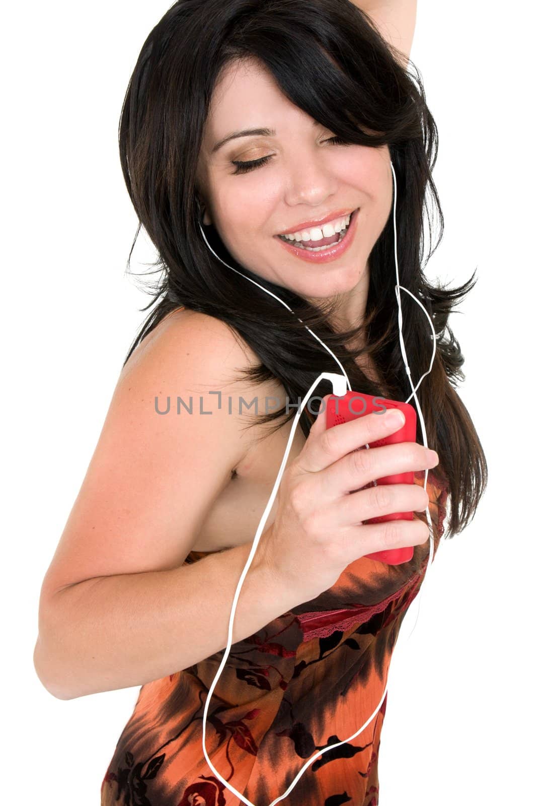 A brunette woman enjoying music