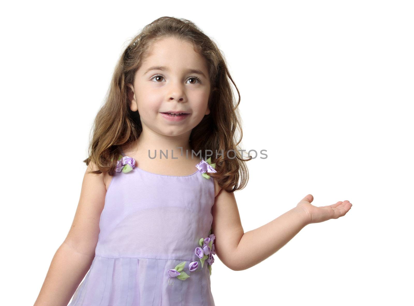 Pretty smiling girl with hand outstretched palm facing upwards.  Suitable to add  your product or a message.