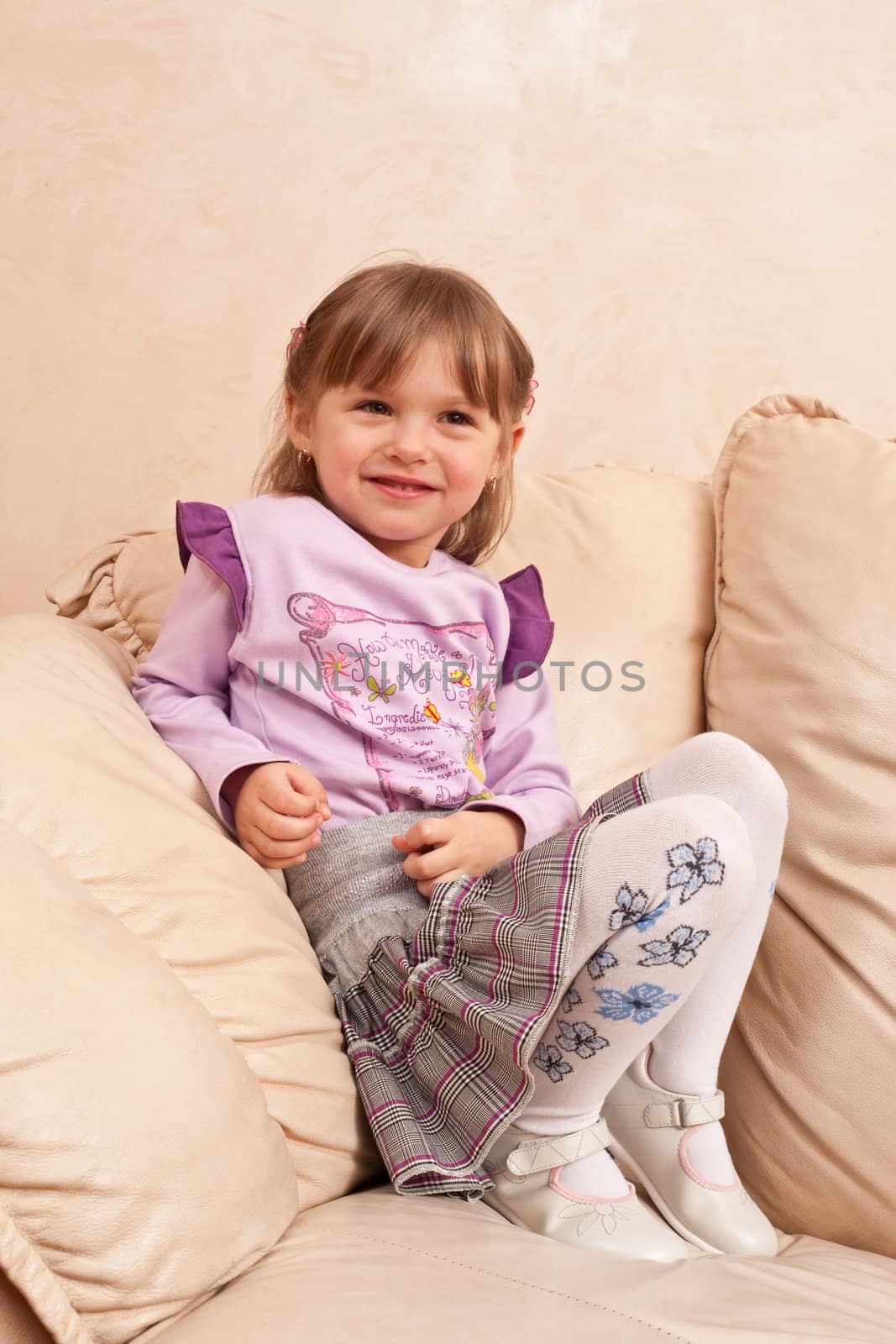 people series: little girl sit on sofa