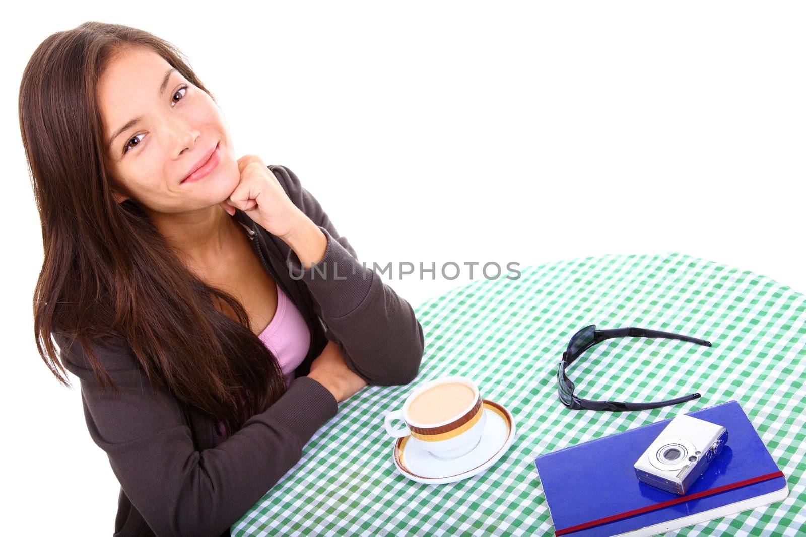 Woman at cafe isolated on white background. Beautiful mixed race asian / caucasian model.