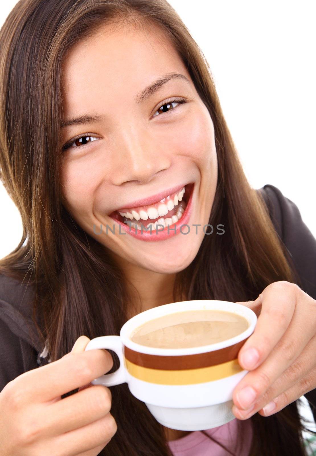 Young woman excited and happy holding her coffee. Isolated on white background.