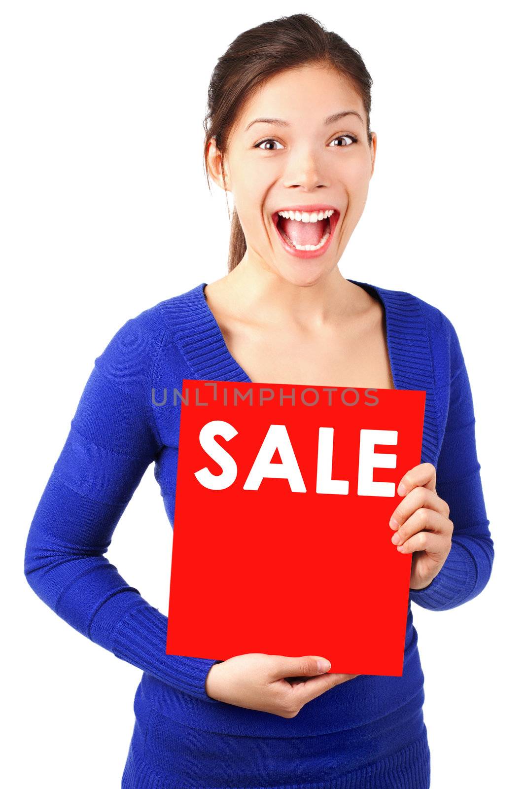 Excited woman with sale sign. Isolated on white background.