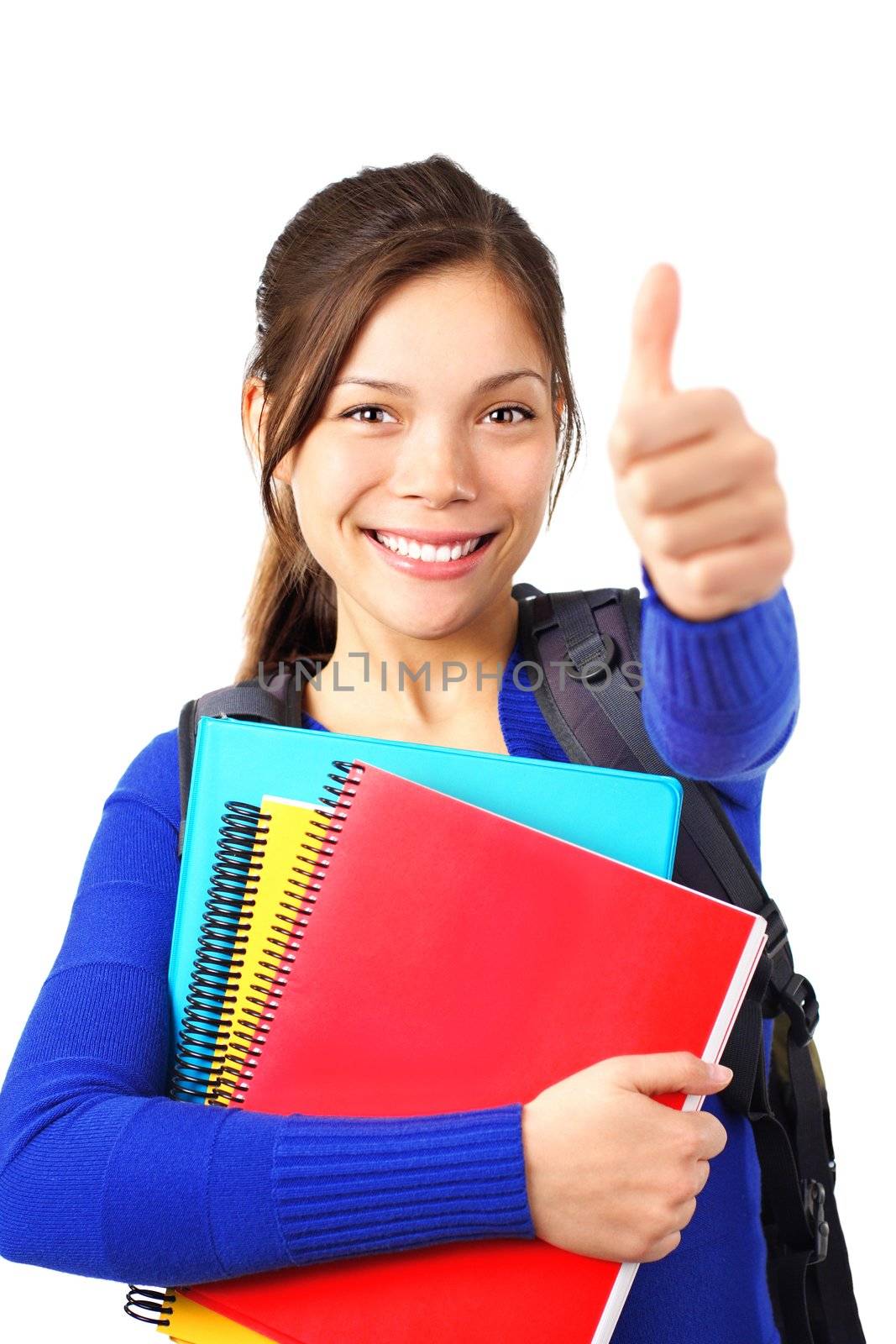Happy college studendt showing thumbs up. Mixed asian / caucasian model. Isolated on white background.