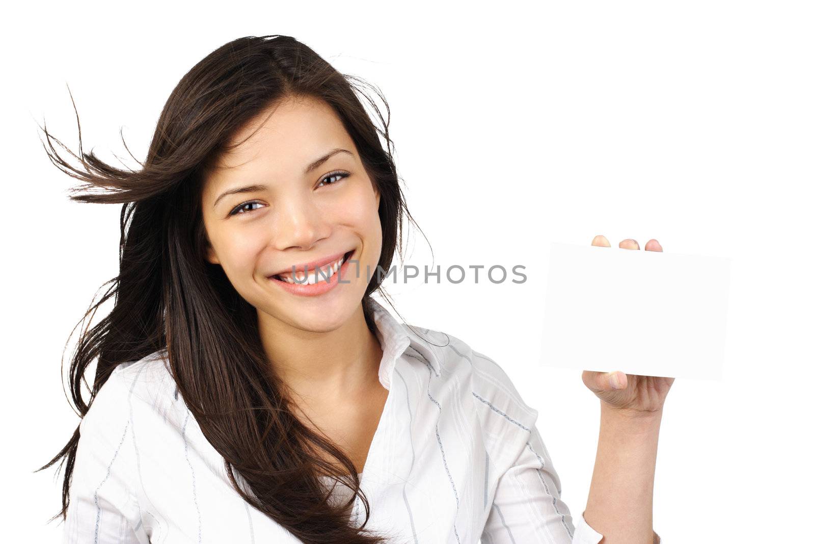 White / empty sign woman.  Beautiful young mixed asian / caucasian woman holding a blank paper card with copy space. Isolated on white background.