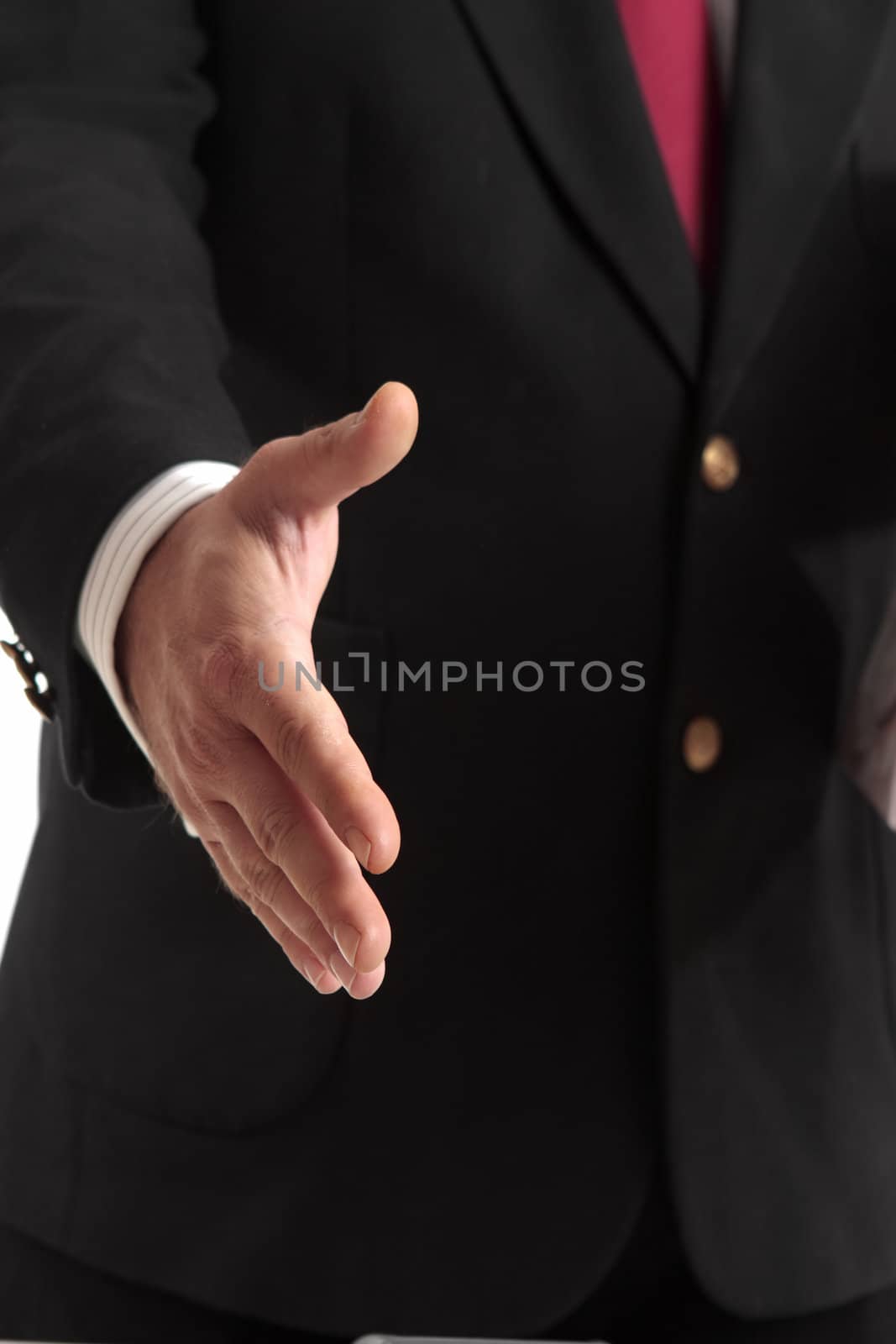 Business handshake, shallow dof focus to fingertips