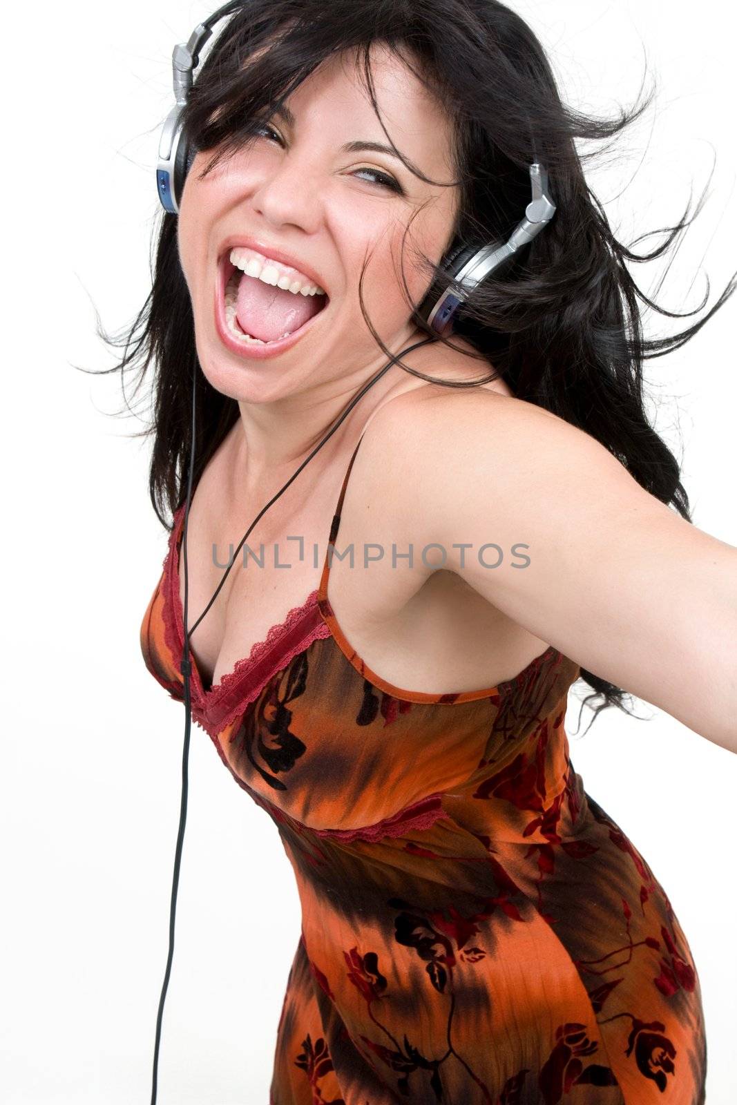 Charismatic woman dancing and enjoying upbeat music
