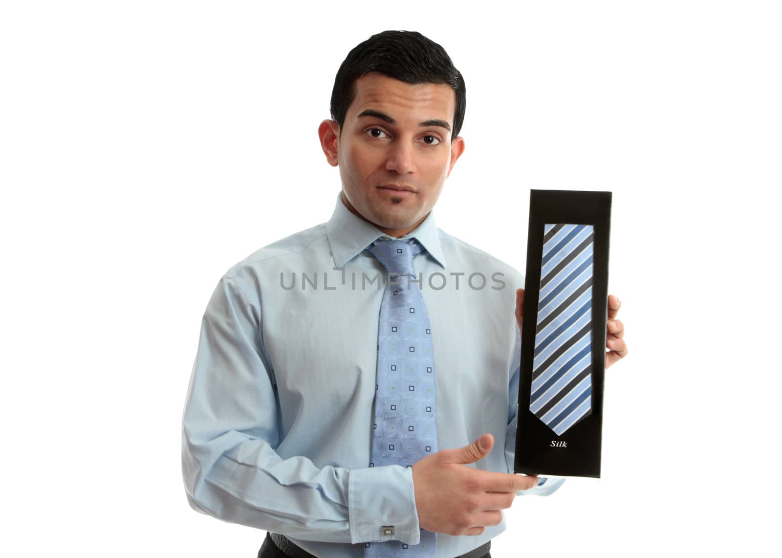 Salesman or businessman holding a tie - or can be other object.
