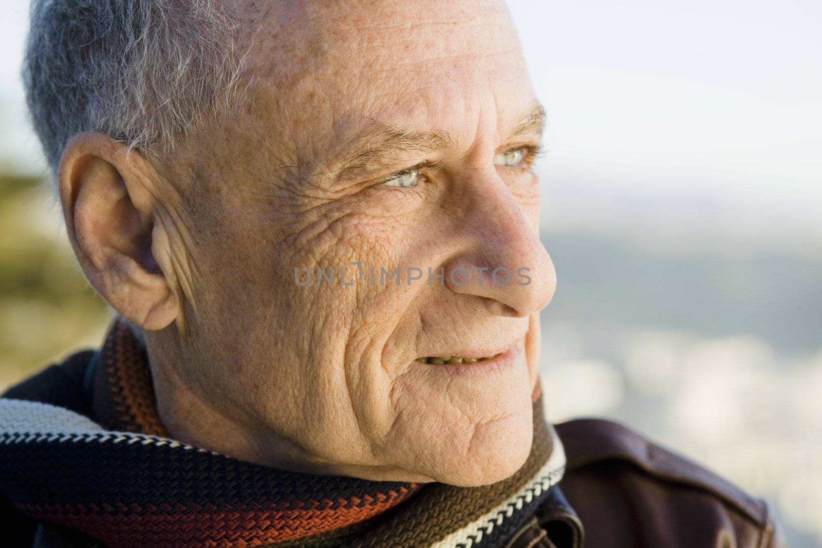 Profile Of A Senior Man Looking Out to Sea