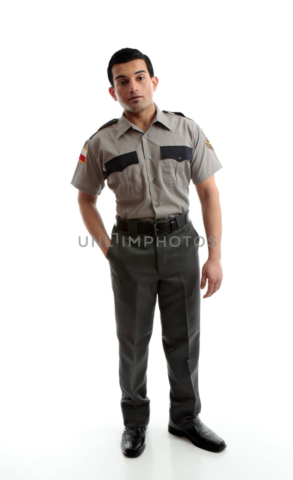 A male worker wearing uniform is standing with one hand in pocket on a white background