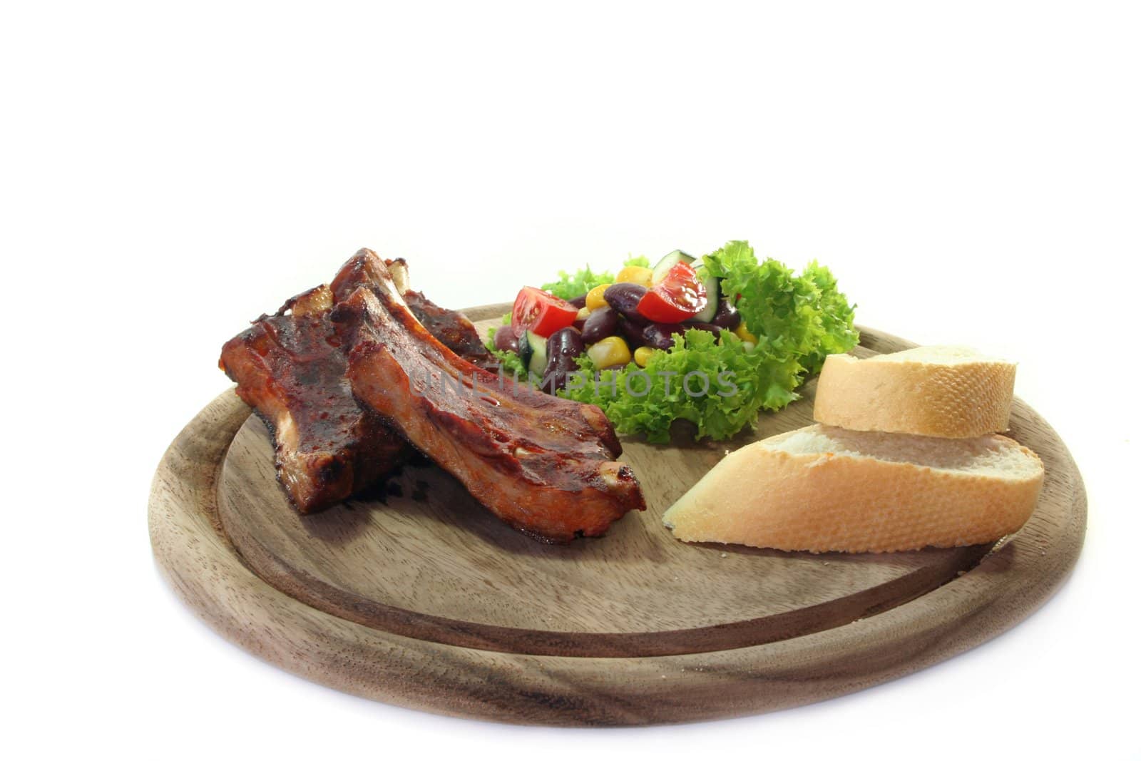 fried spare ribs with bread salad and Texas