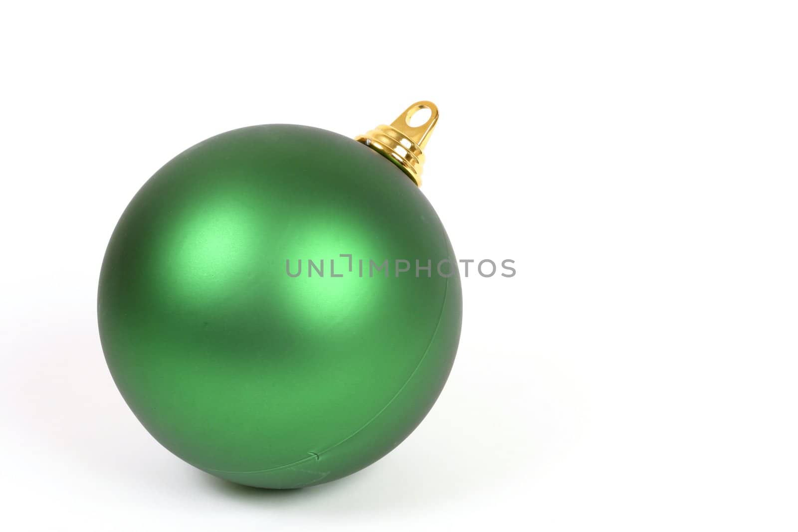 A plain christmas ball decoration on a white background