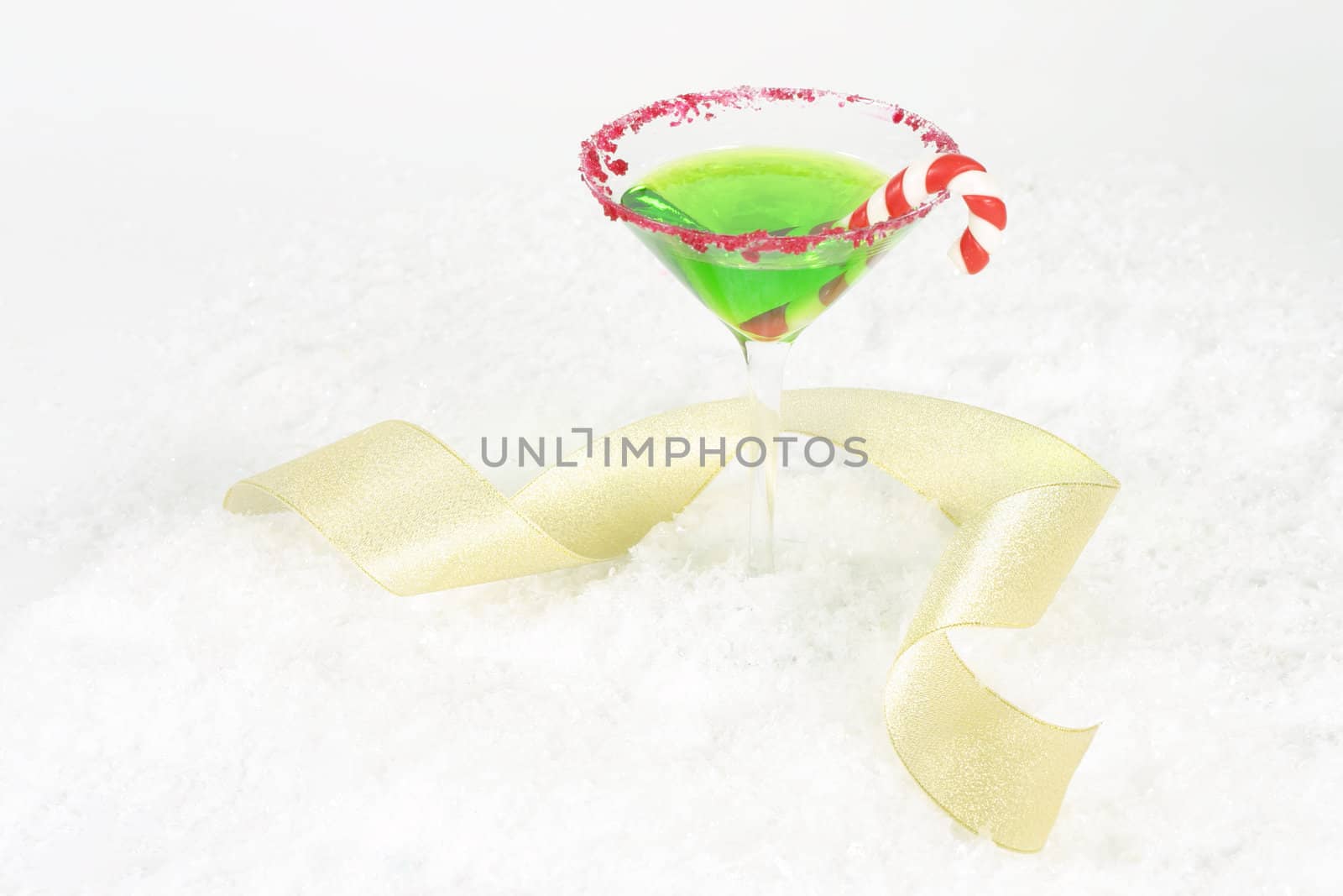 Christmas martini and gold curling ribbon - landscape.