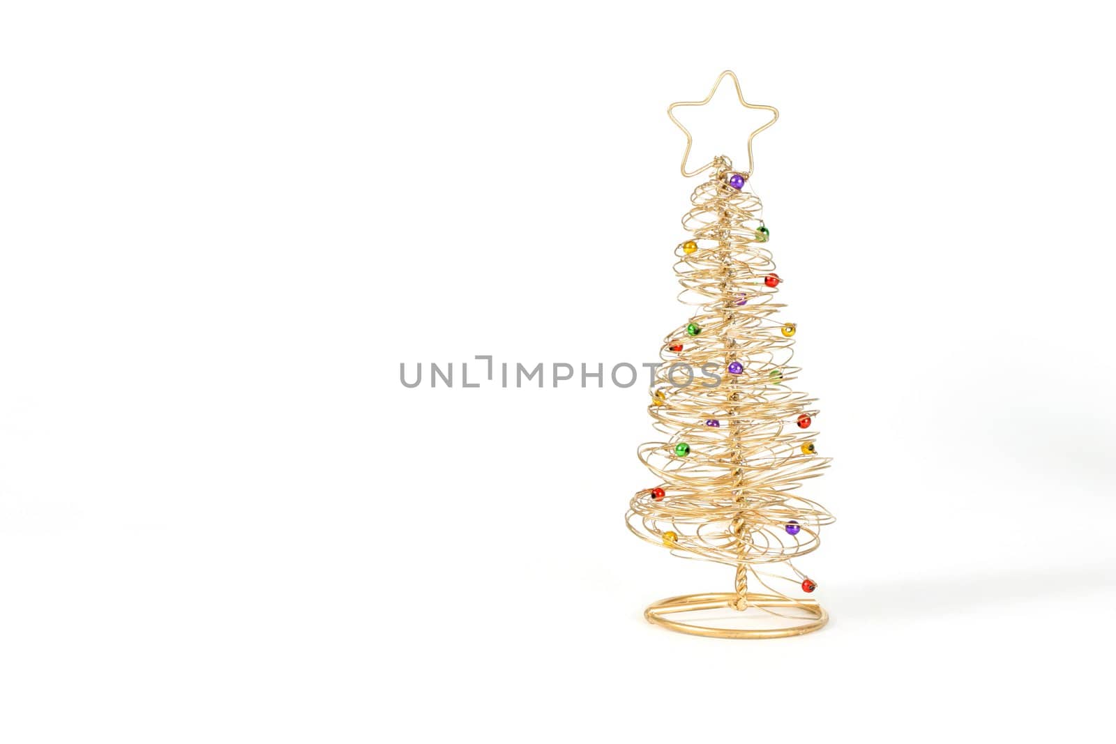 Gold wired Christmas tree on white background.