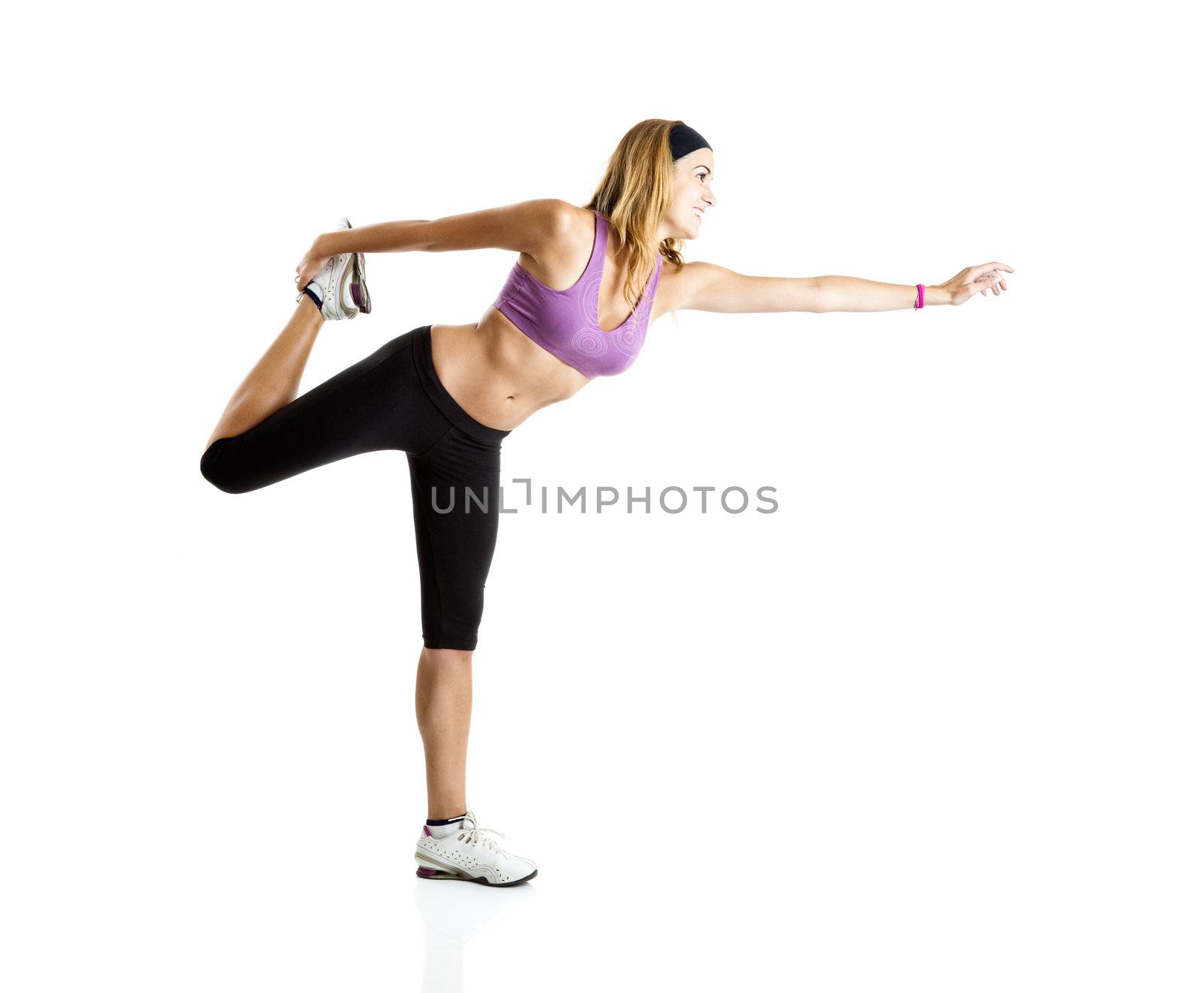 Beautiful young woman doing fitness exercises, isolate on white