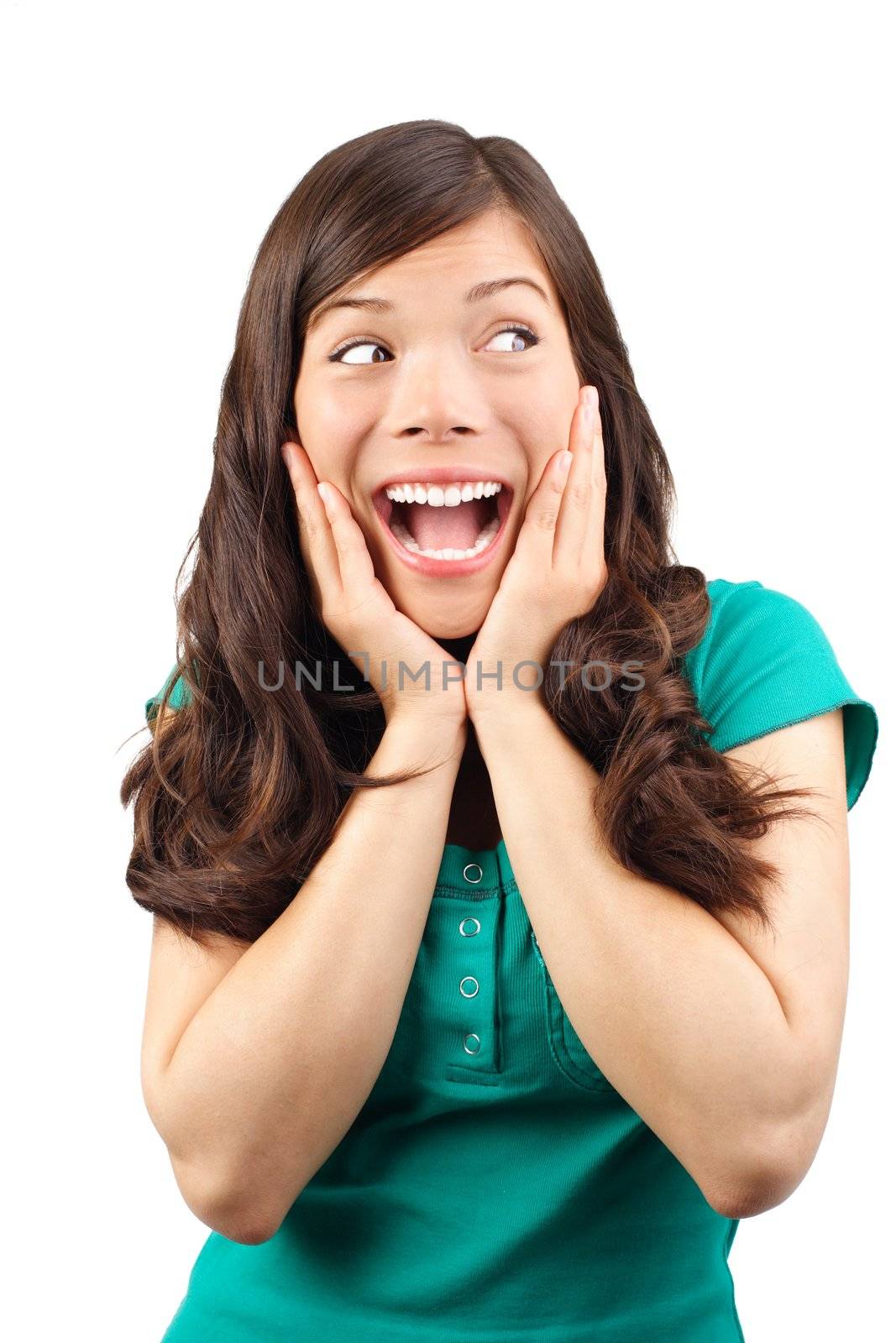 young mixed race woman very excited looking away. Isolated on white.