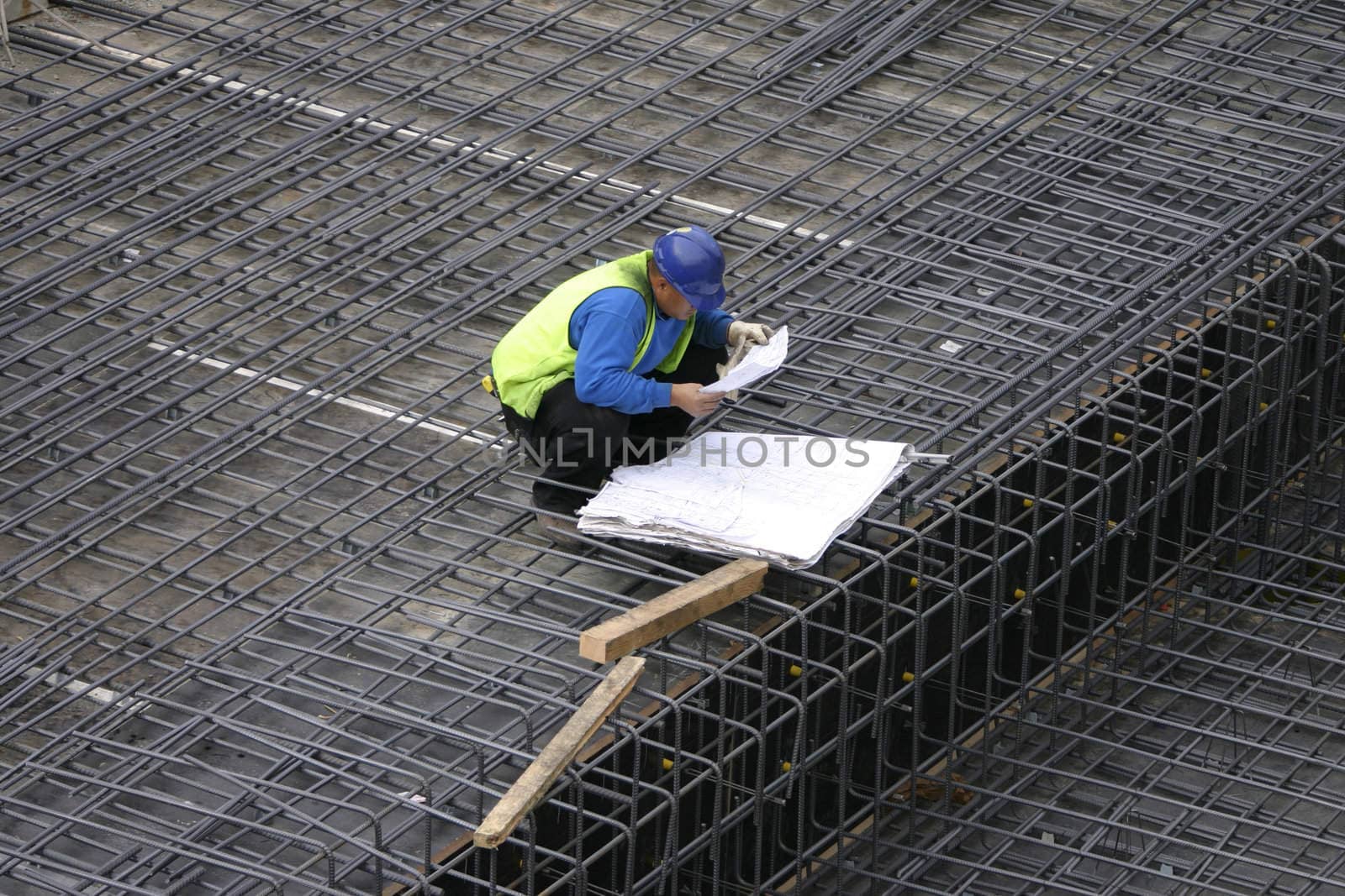 Project Manager reading the site plans by lovleah