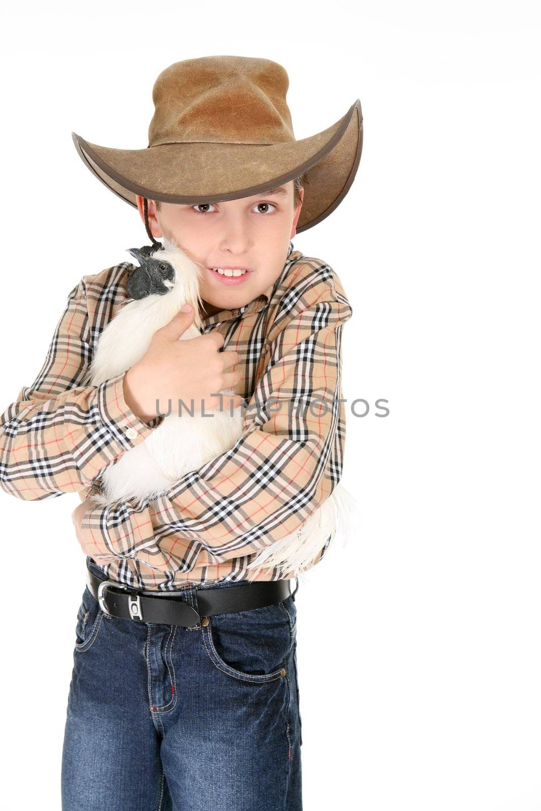 Boy cuddling a pet chicken by lovleah