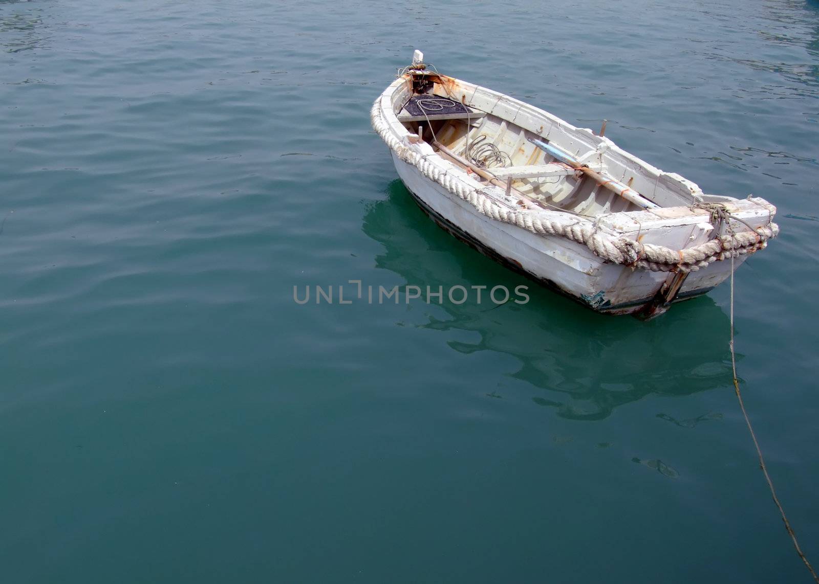 Old and battered fishing boatl, in Malta