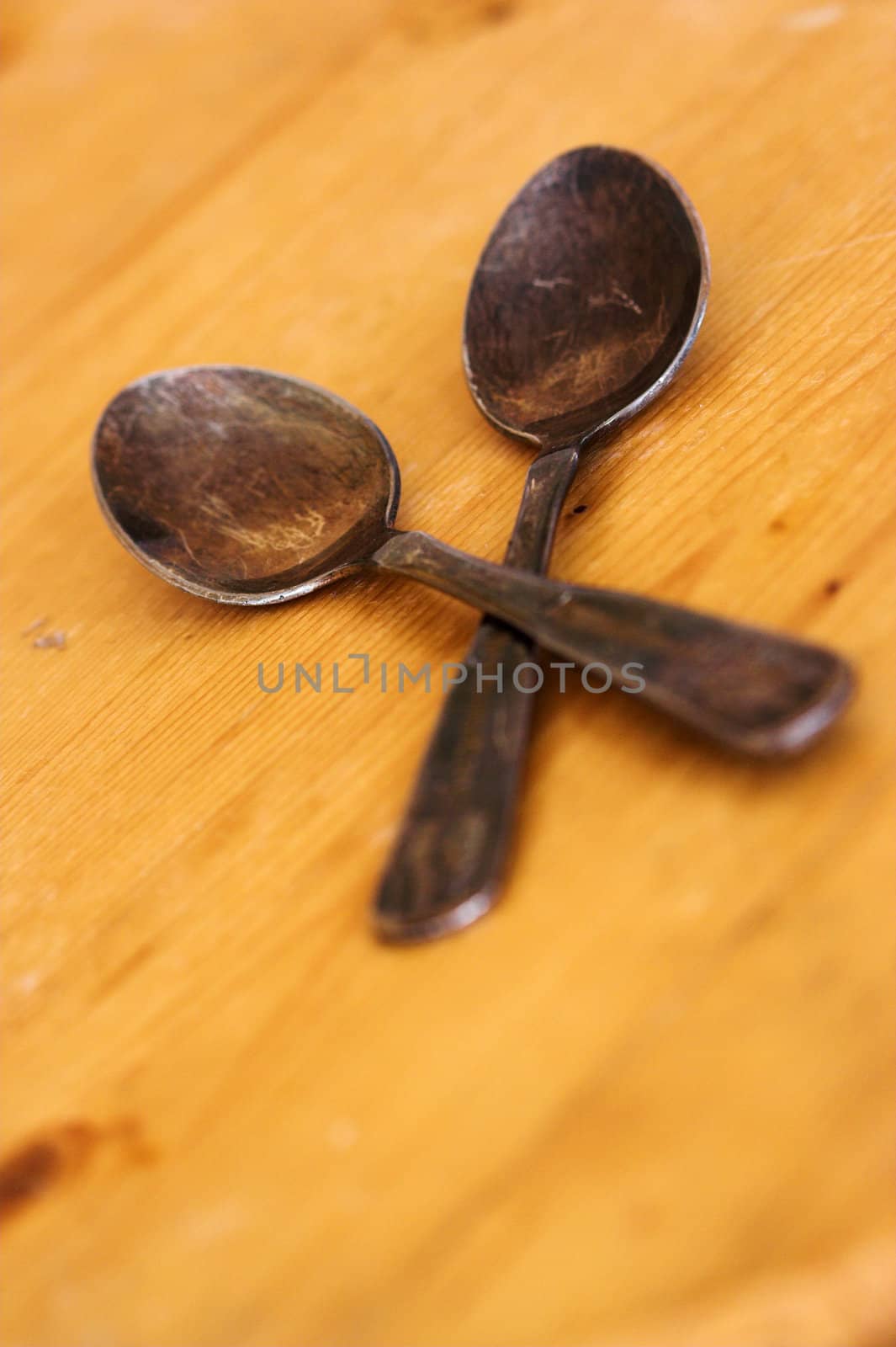 Two vintage spoons close up