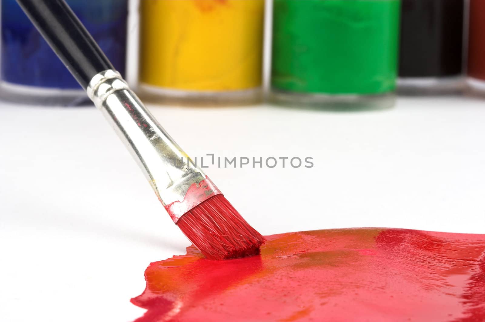 A brush paint in red