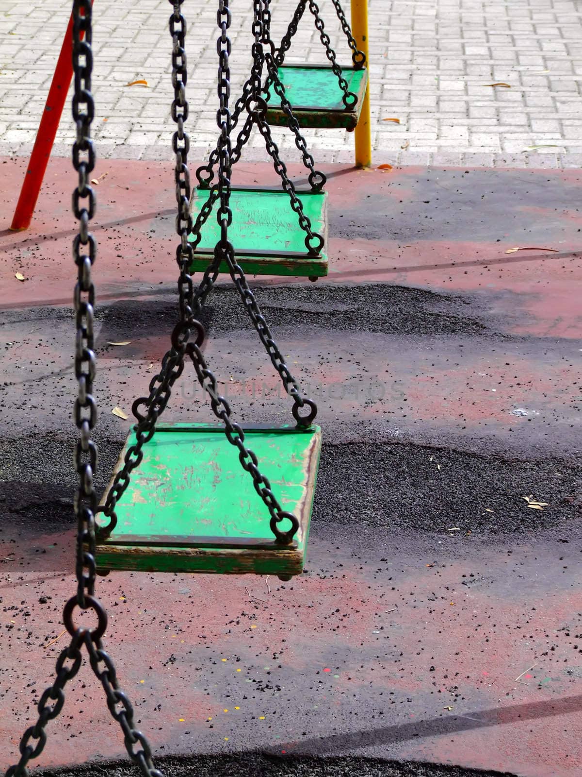 Vintage and old swingset at deserted playground in Malta