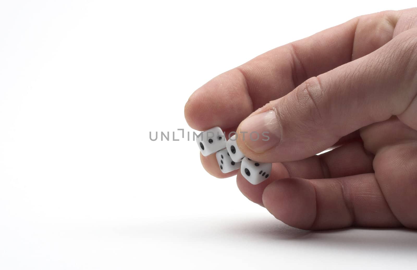 Dices in hand over white background