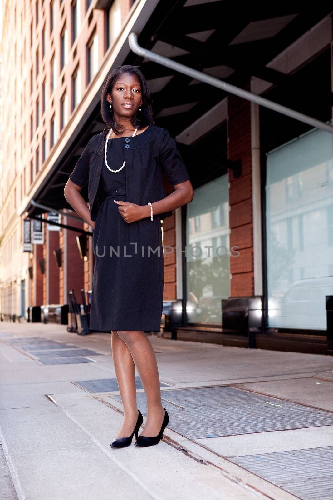 A business woman in a natural street setting