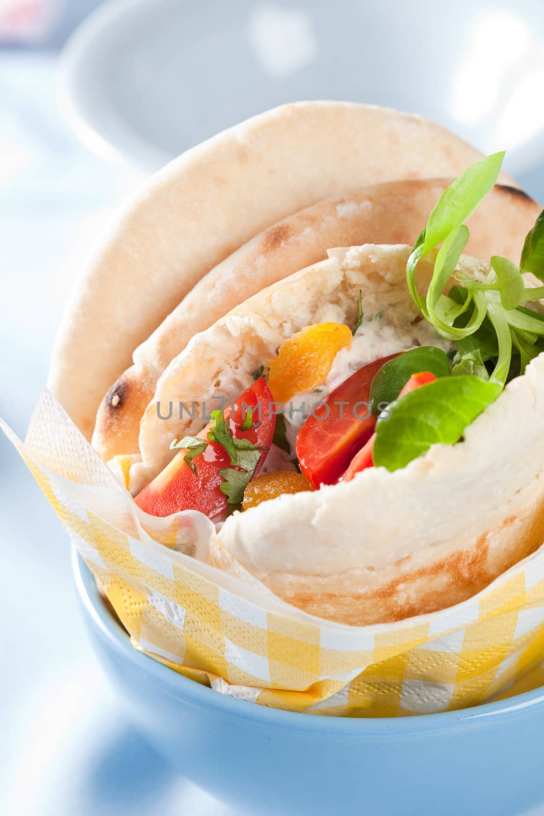 Pita bread filled with tuna, tomato, apricot and yogurt