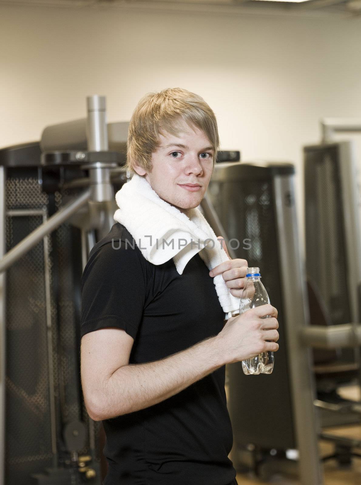 Portrait of a young man at a fitness center