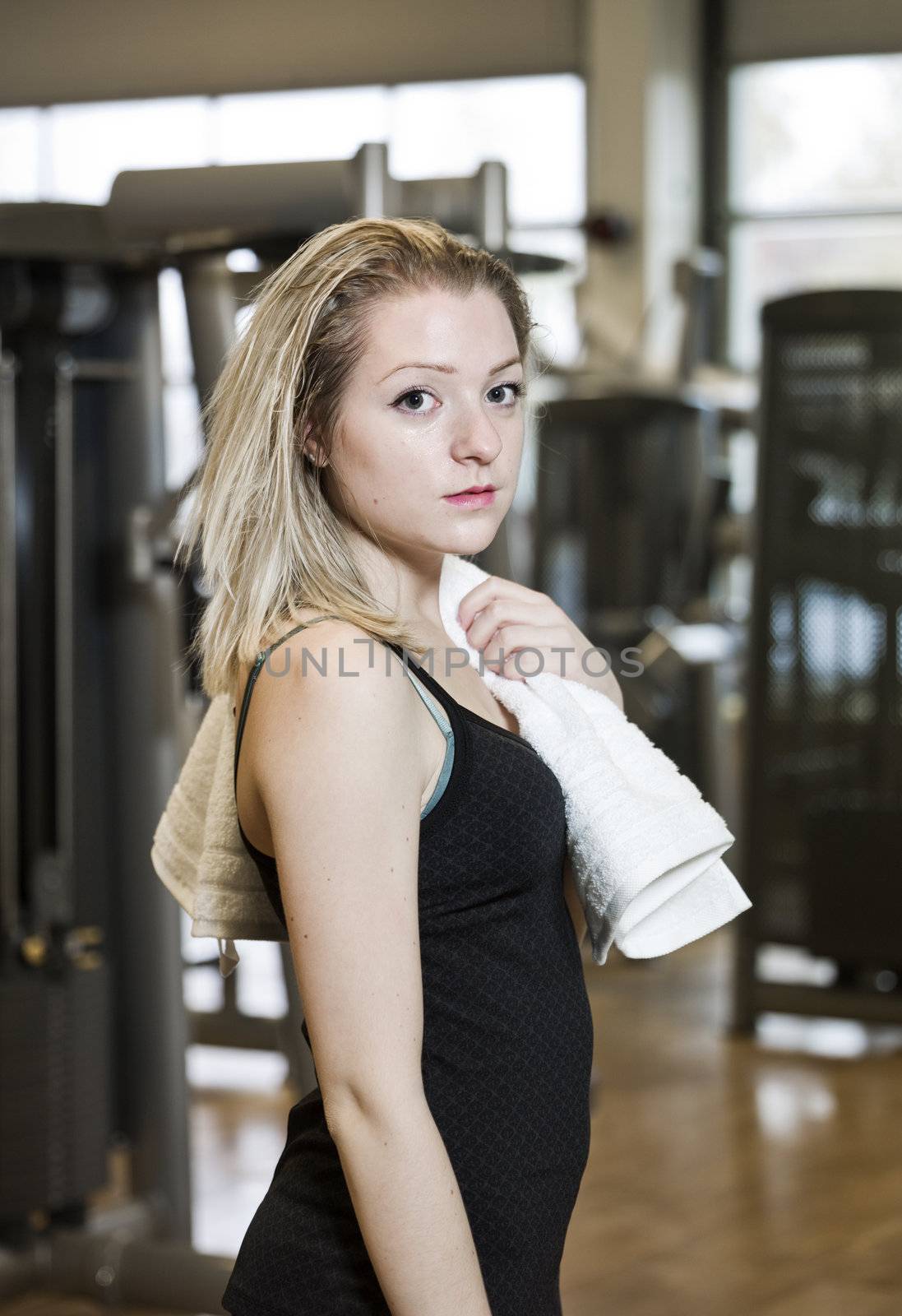 Portrait of a young woman at the gym