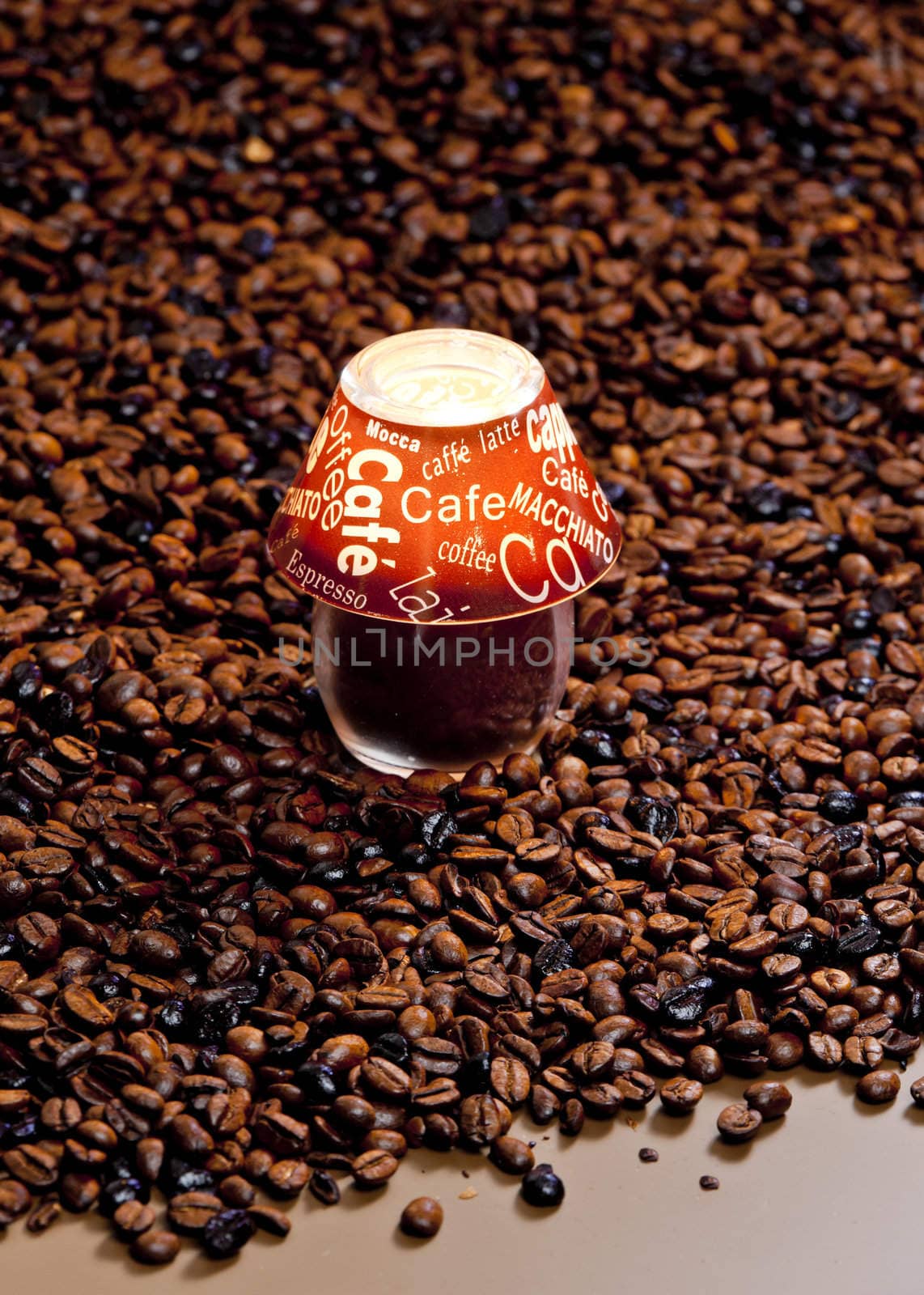 still life of candle and coffee beans
