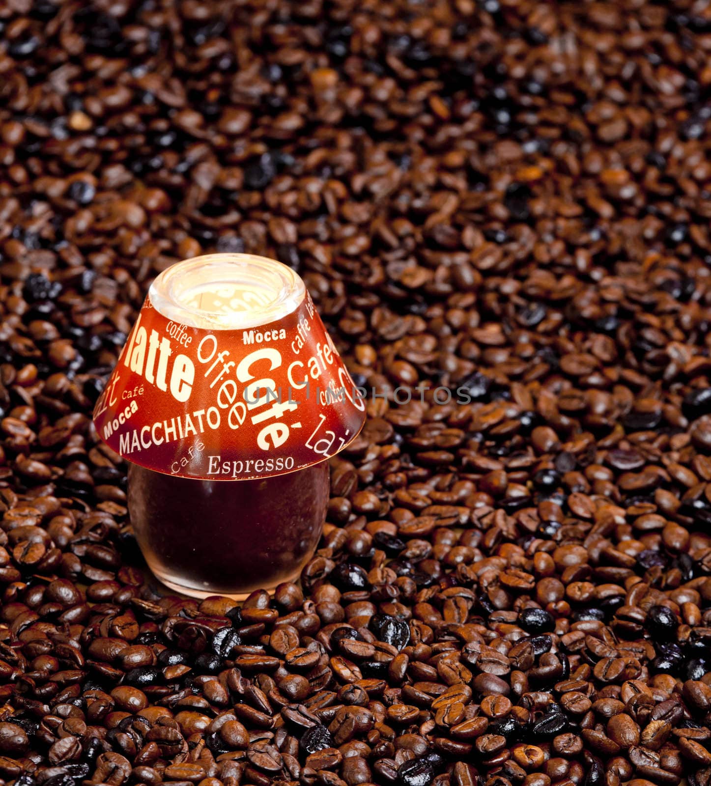 still life of candle and coffee beans