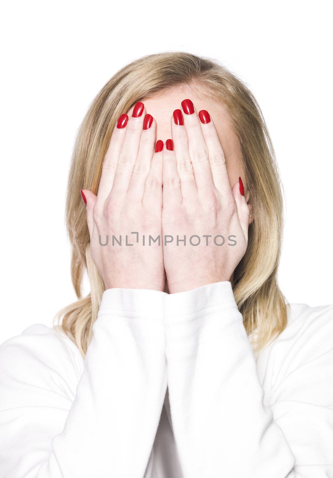 Young woman covering her face by gemenacom