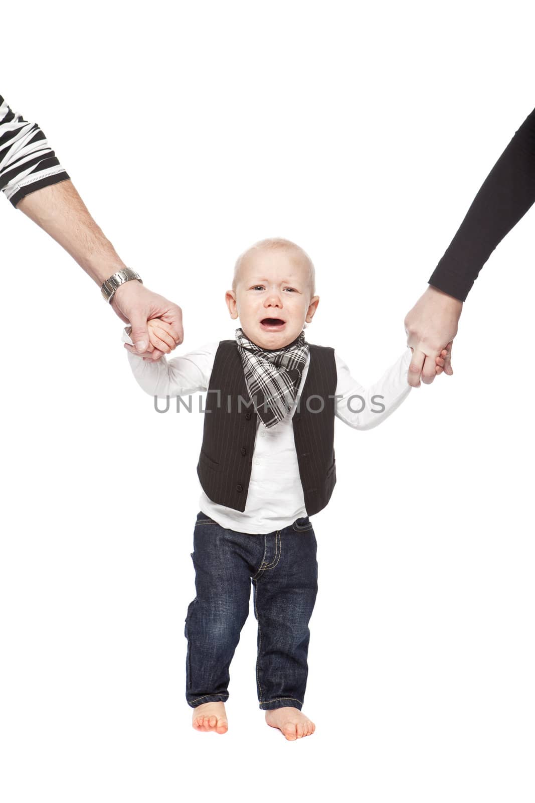 Young baby holding hands with his parents against white