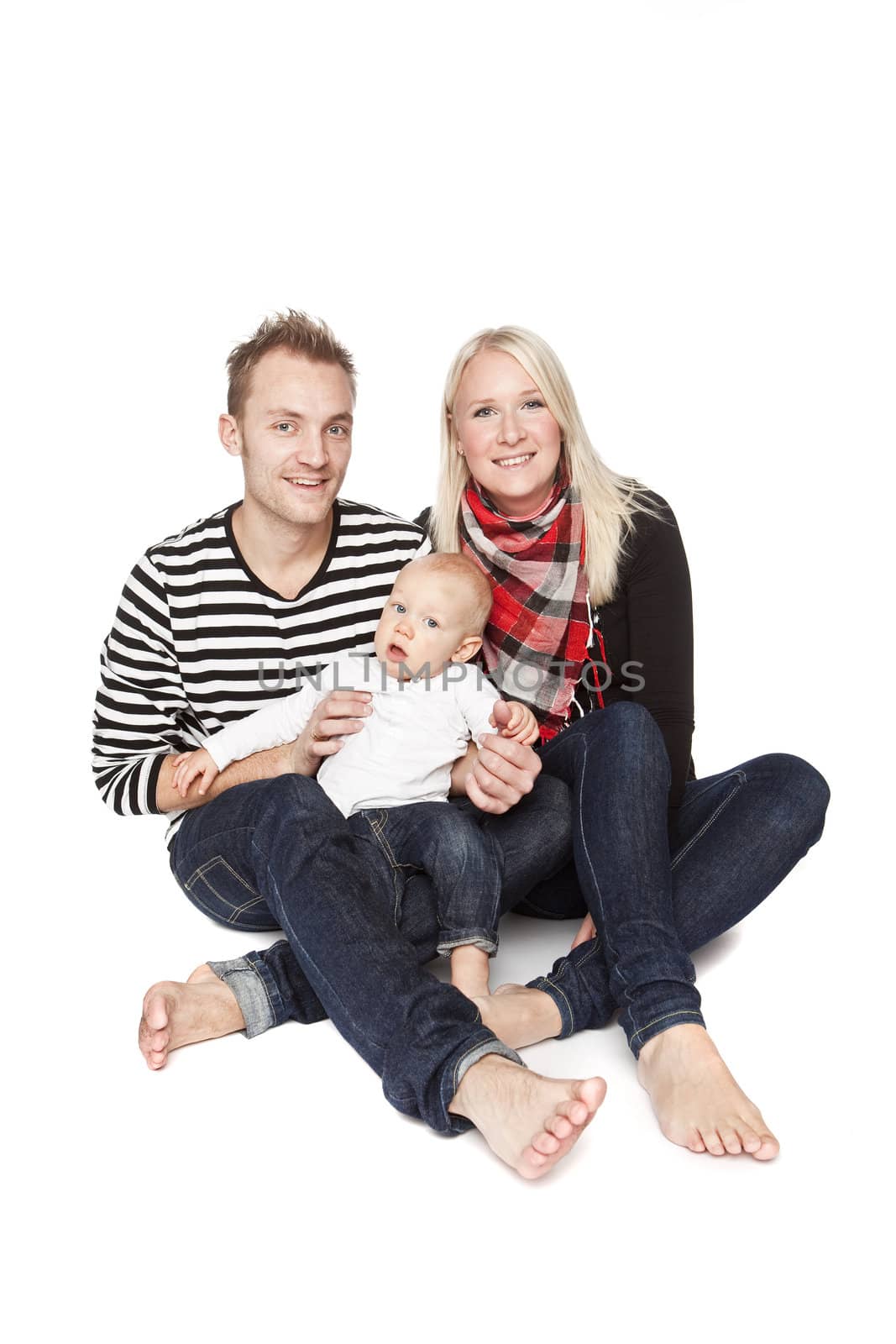 Happy family portrait isolated against a white background