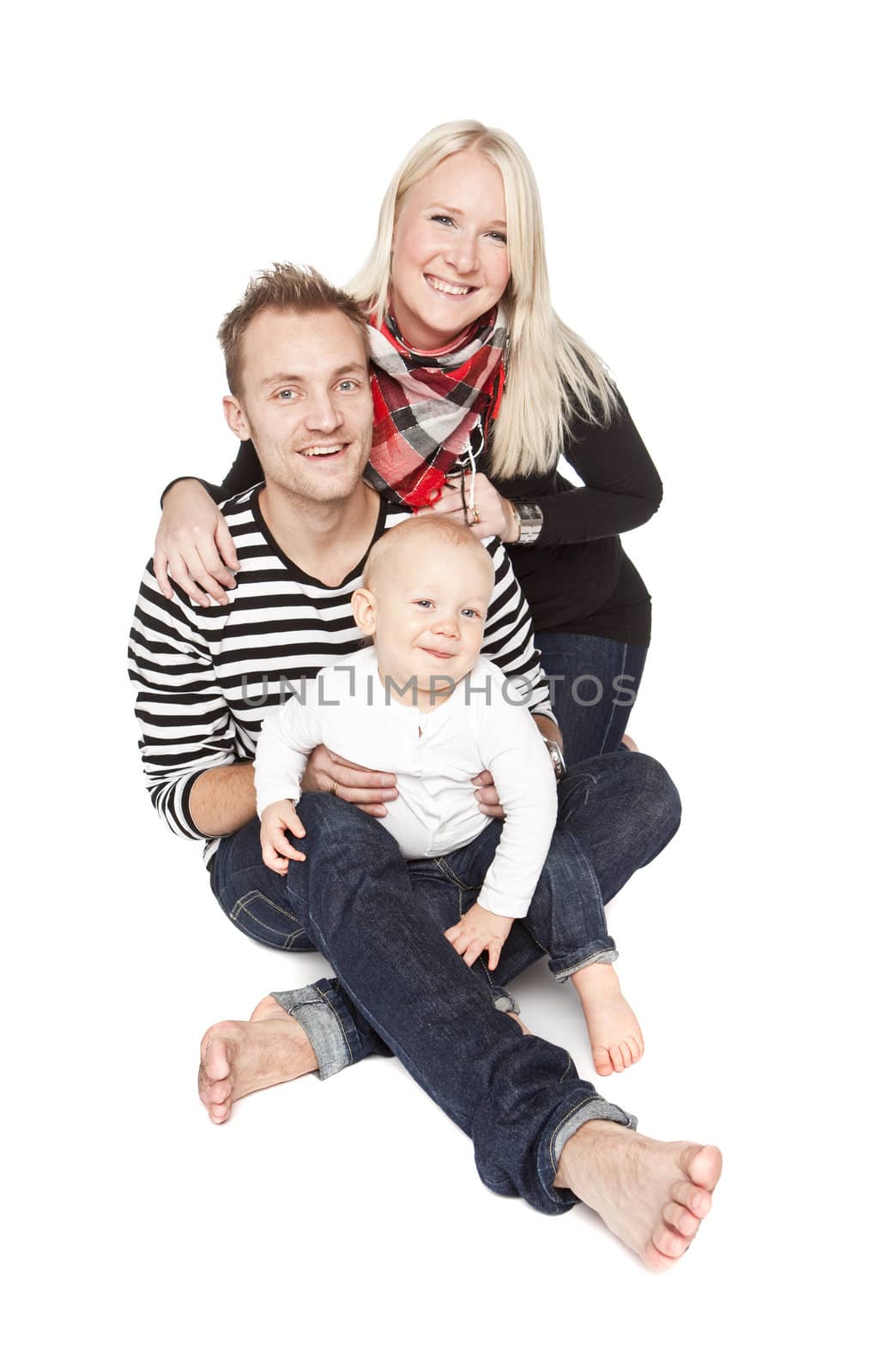 Happy family portrait isolated against a white background