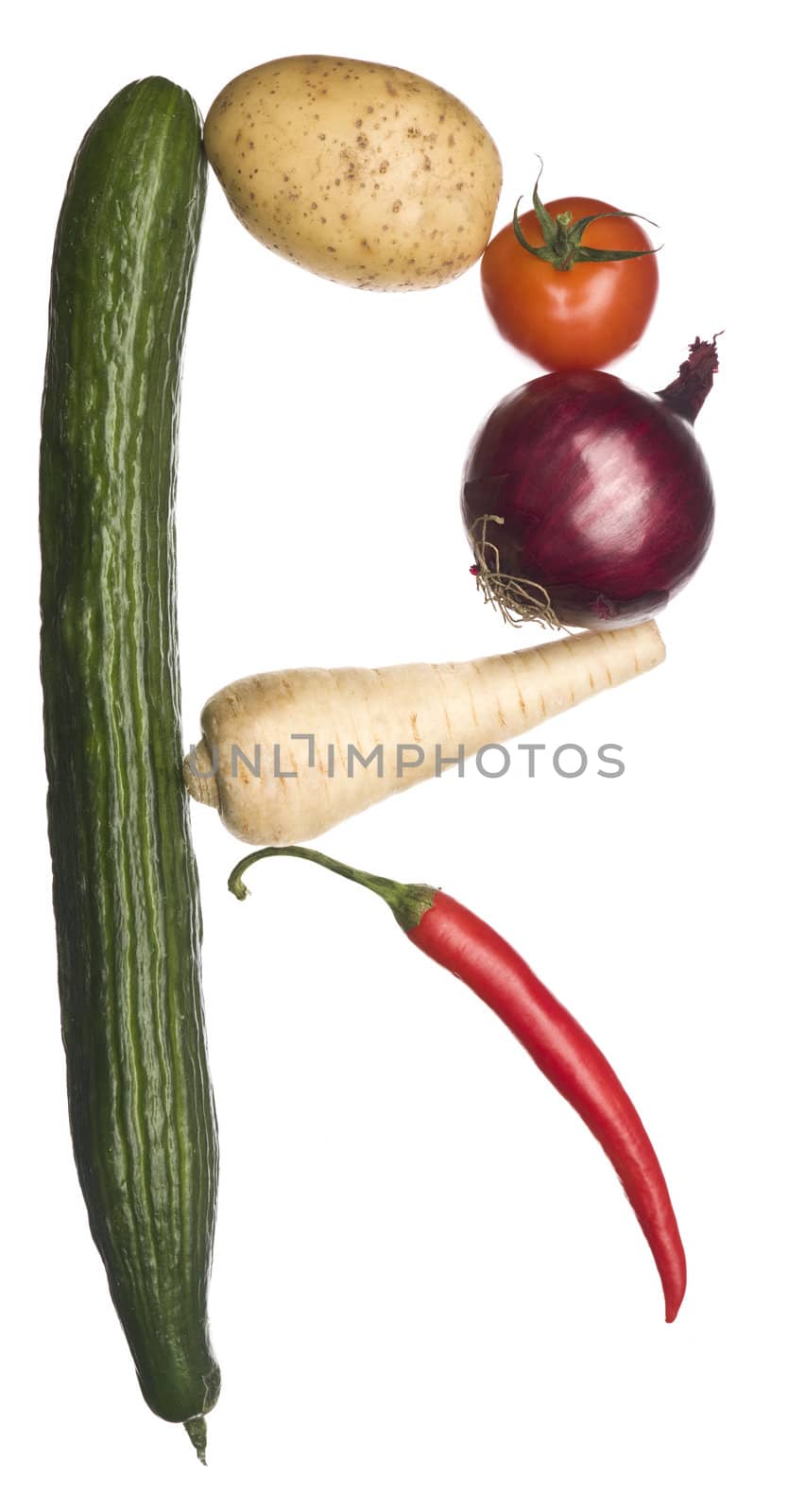 The letter 'R' made out of vegetables isolated on a white background