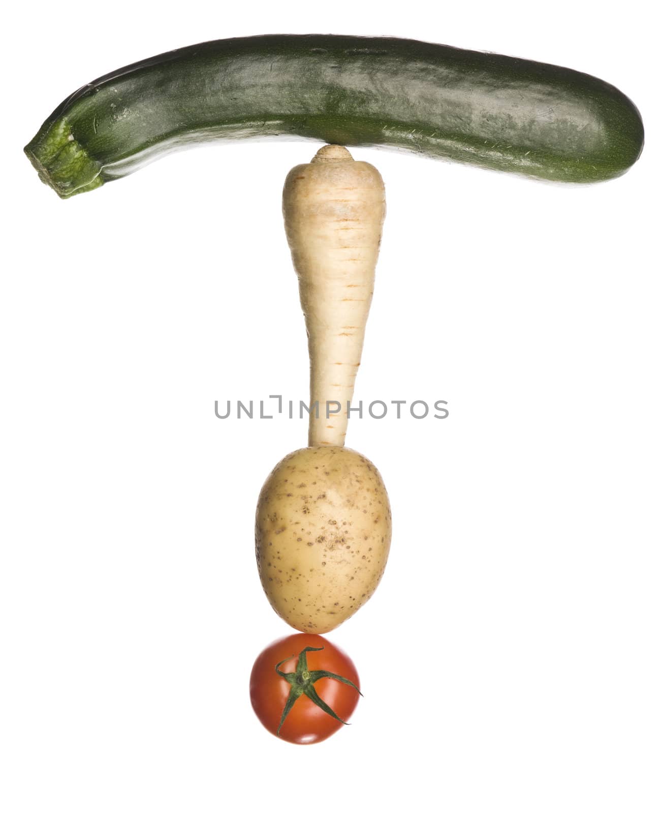 The letter 'T' made out of vegetables isolated on a white background