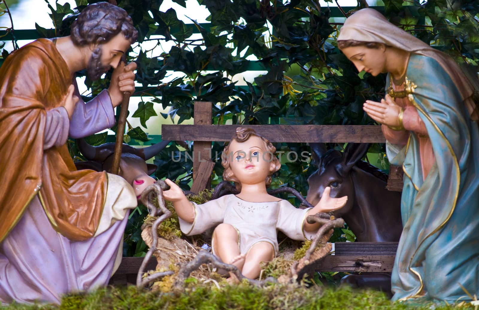 statues of the Holy Family in a crib