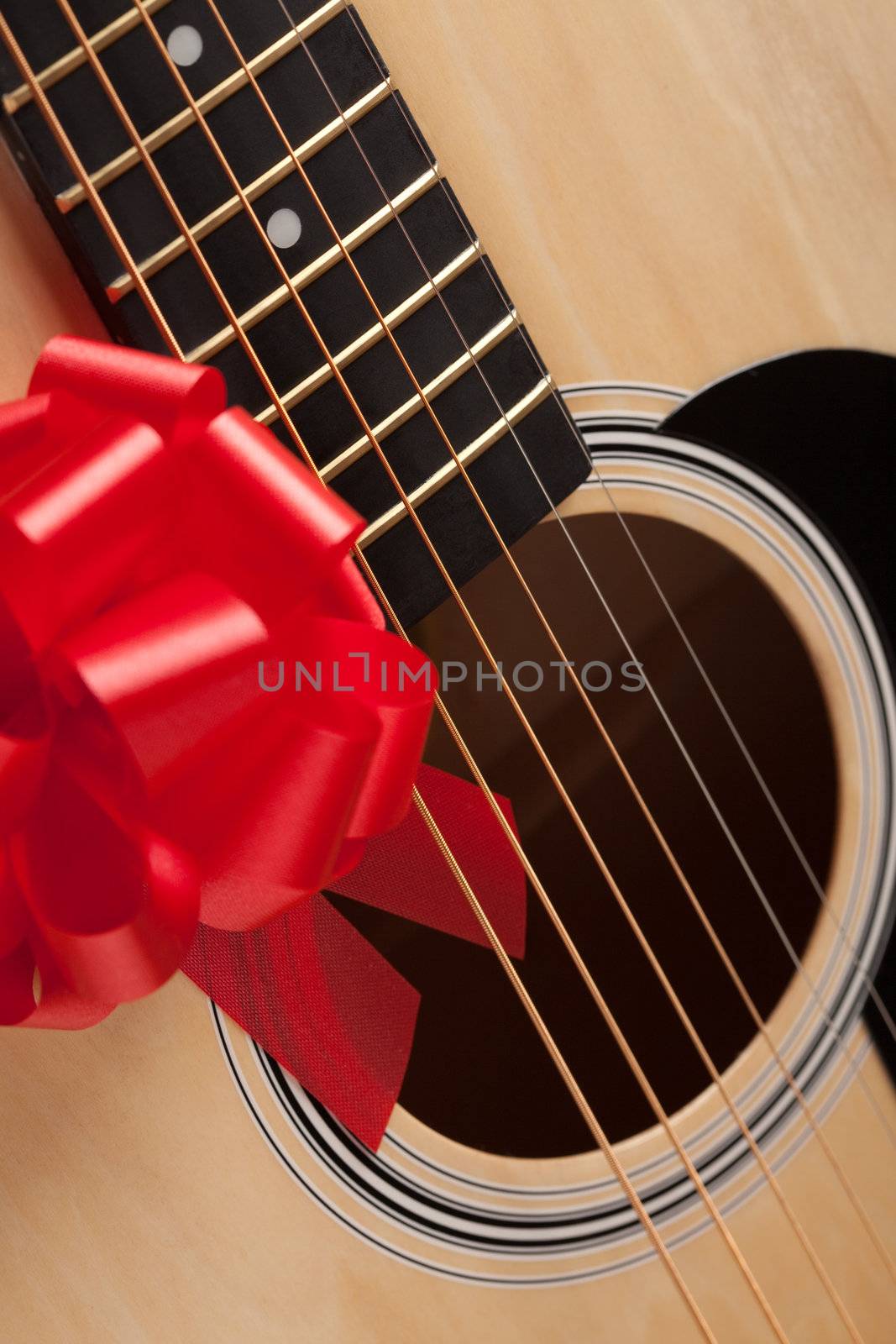 Guitar Strings with Red Ribbon by Feverpitched