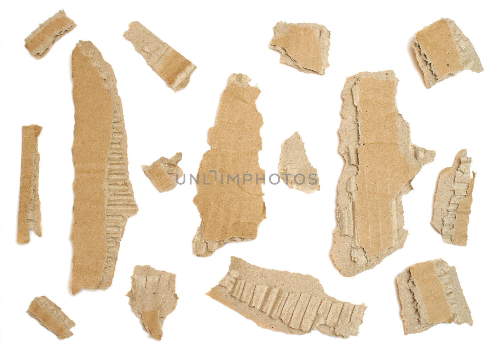 Many cardboard pieces isolated on a white background.