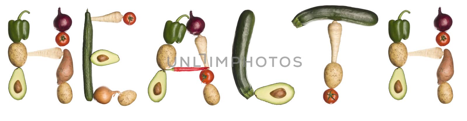 The word 'health' made out of vegetables isolated on a white background