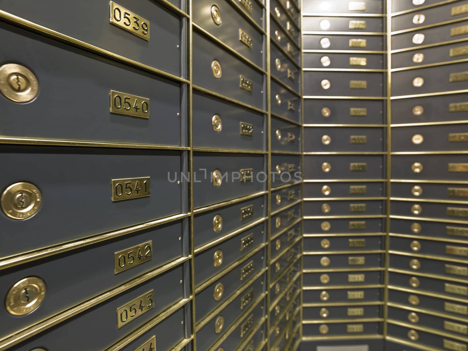 Rows of luxurious safe deposit boxes in a bank vault