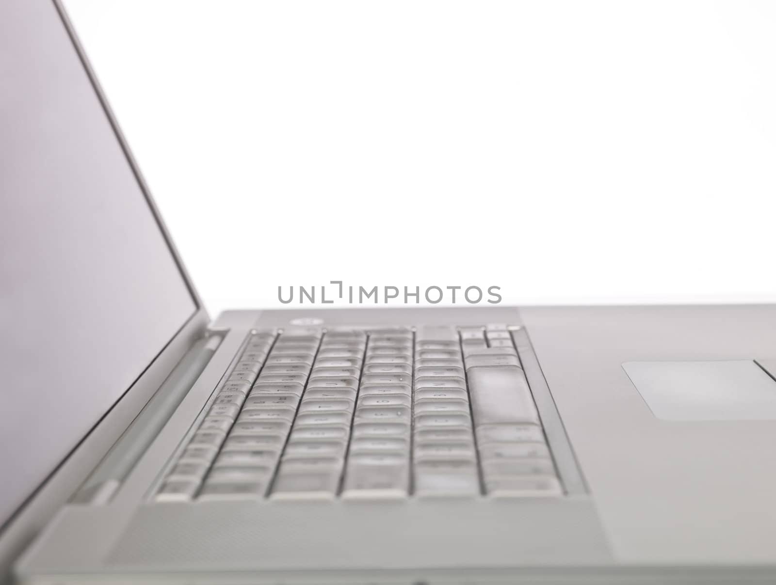 Close up on a laptop with a white background