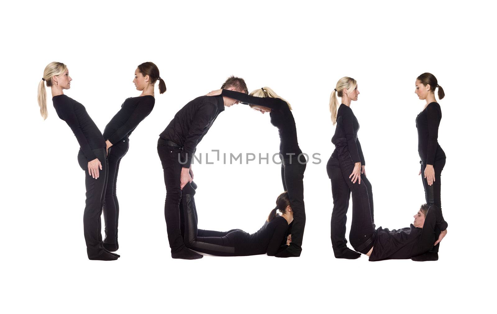 Group of people forming the word 'YOU', isolated on white background.